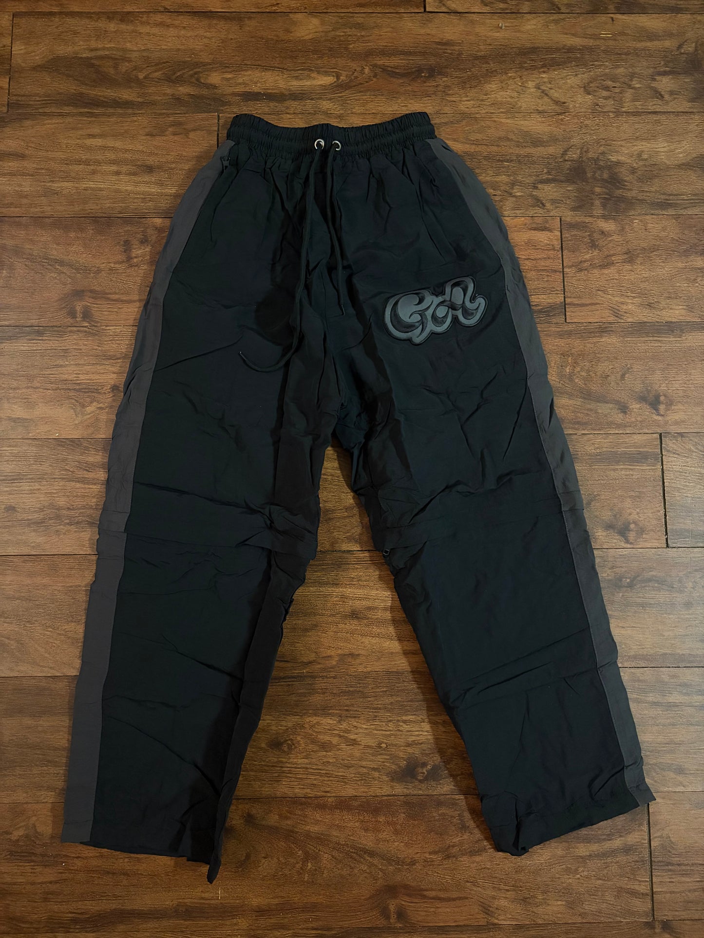 BLACK FAITHFUL WINDBREAKER PANTS